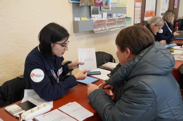 Woman giving help in Ukraine