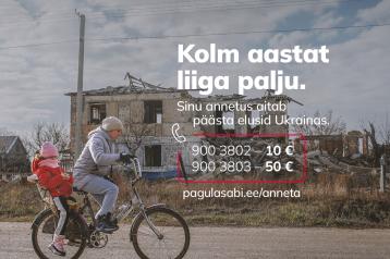 Woman on a bicycle with a child in war torn Ukraine