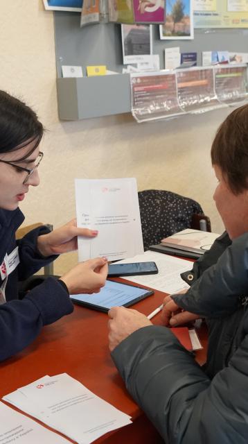 Woman giving help in Ukraine