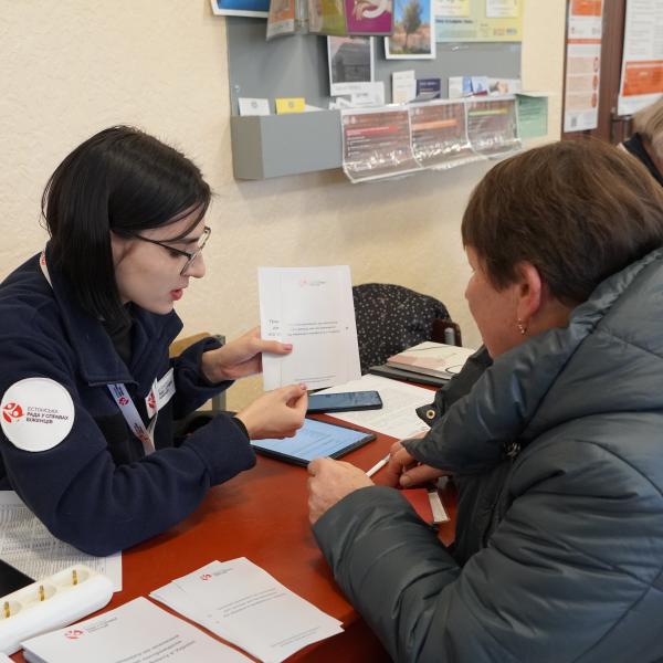 Woman giving help in Ukraine