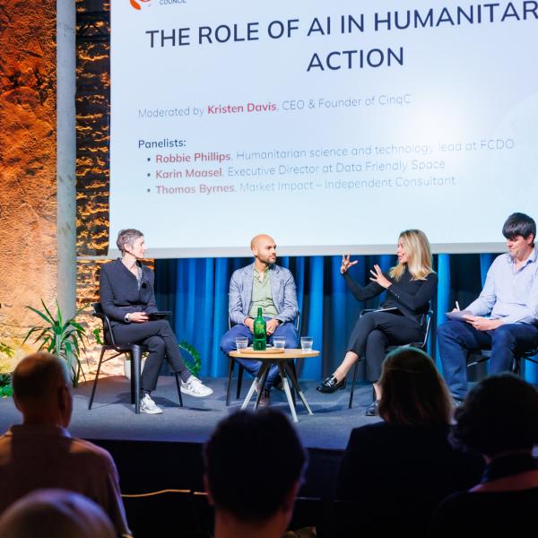 People sitting on a stage 